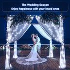 Cool White 100 LED battery string lights wrapping a wedding arch at night