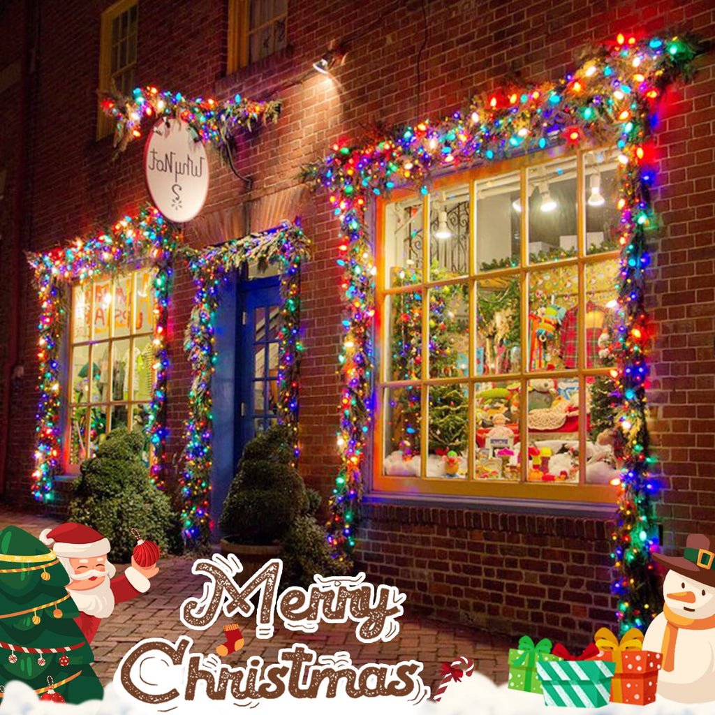 Multicolor 100 LED battery string lights wrapped around a Christmas shopfront