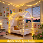 Warm white 100 LED battery string lights framing a kids bed canopy