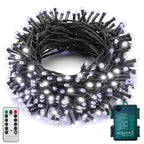 Cool white 100 LED battery string lights on dark green wire coiled with remote and waterproof battery case