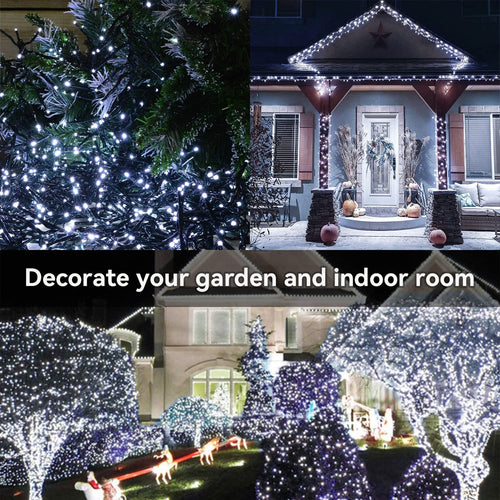 Cool white 100 LED dark green wire string lights decorating a Christmas tree, front porch and garden trees at night
