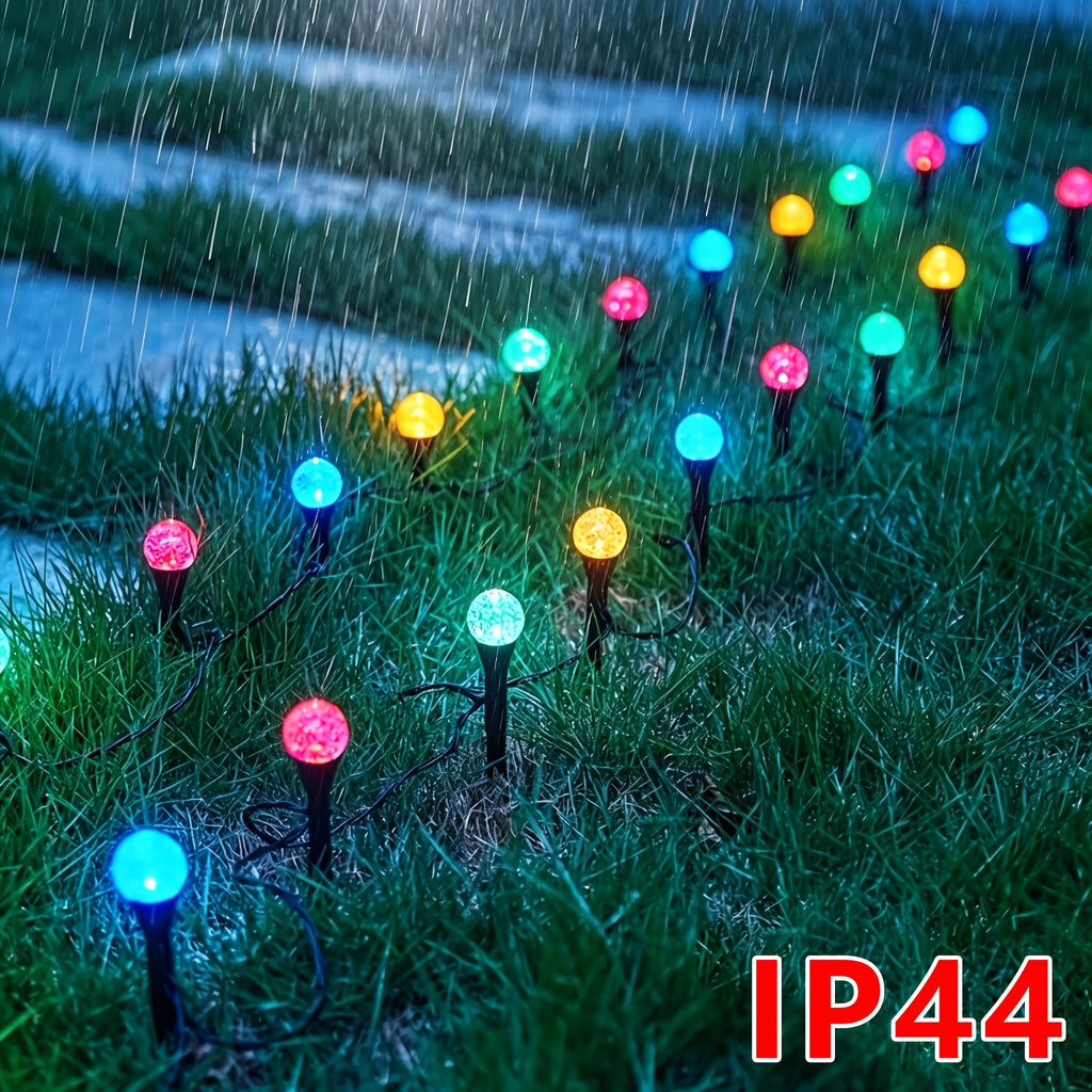 Cool white solar crystal bubble ball stake lights in garden at night